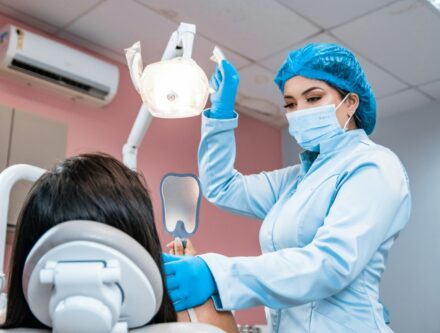Woman having her teeth checked by a dentist during an appointment