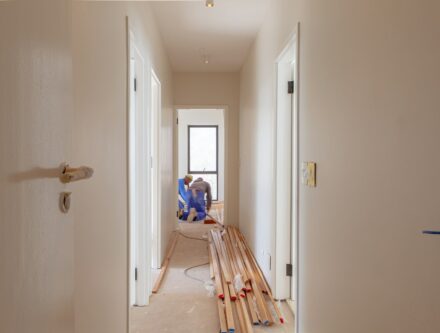 Men working on a house during building work, where trusted builders matter