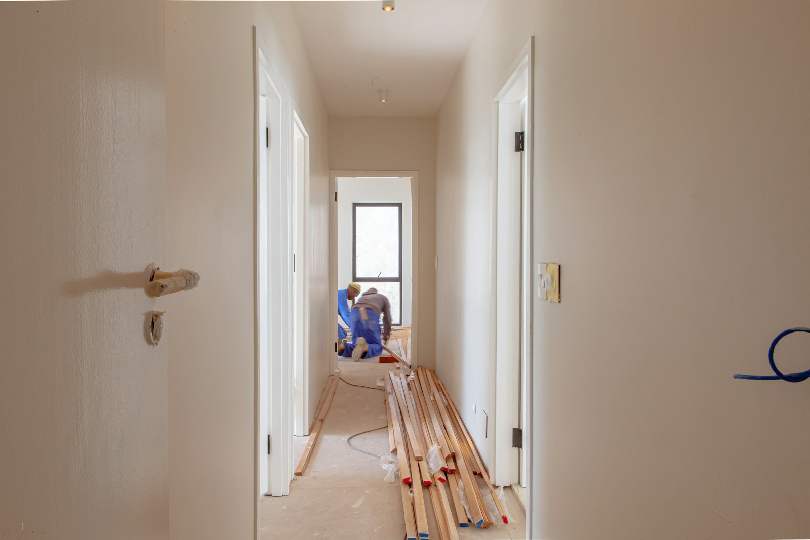 Men working on a house during building work, where trusted builders matter